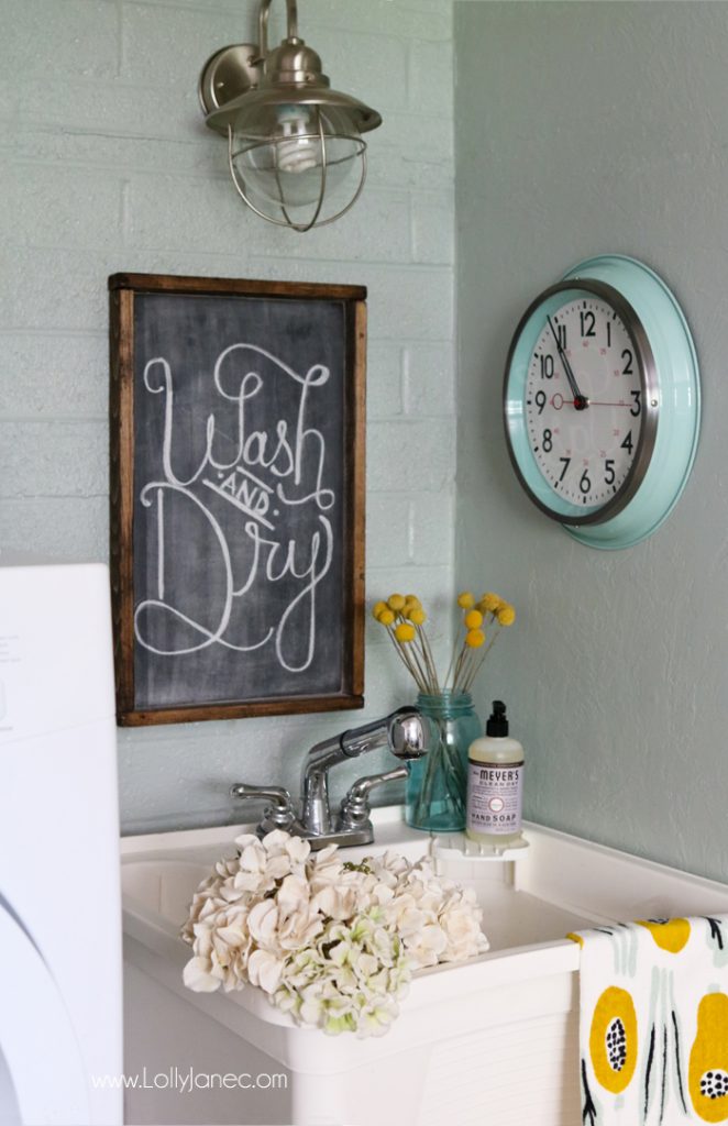 Easy step-by-step tips to spruce up your laundry room on a budget! We transformed this space for less than $300!