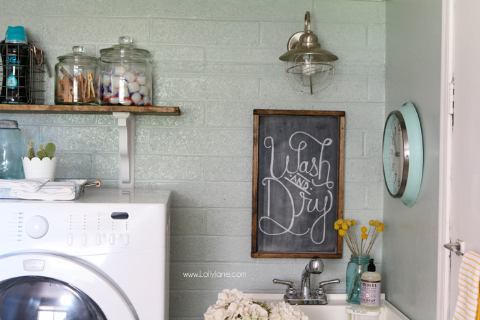 Easy step-by-step tips to spruce up your laundry room on a budget! We transformed this space for less than $300!
