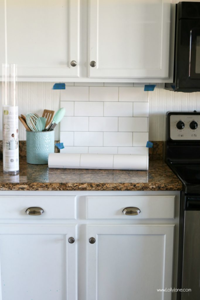 Faux Subway Tile Backsplash... this is WALLPAPER! Looks like real tile, get the easy how-to which is perfect for renters or those on a budget!