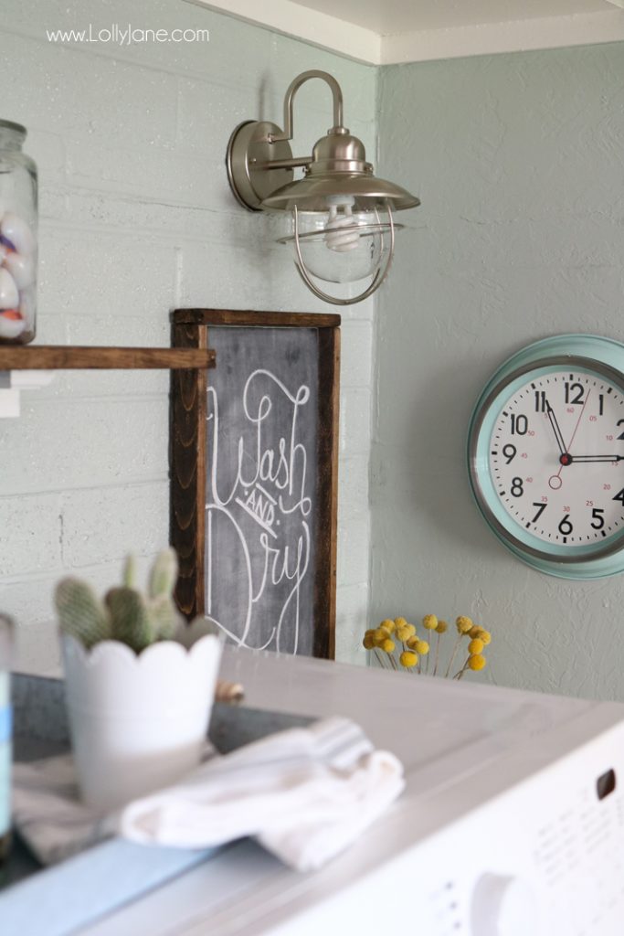 Easy step-by-step tips to spruce up your laundry room on a budget! We transformed this space for less than $300!