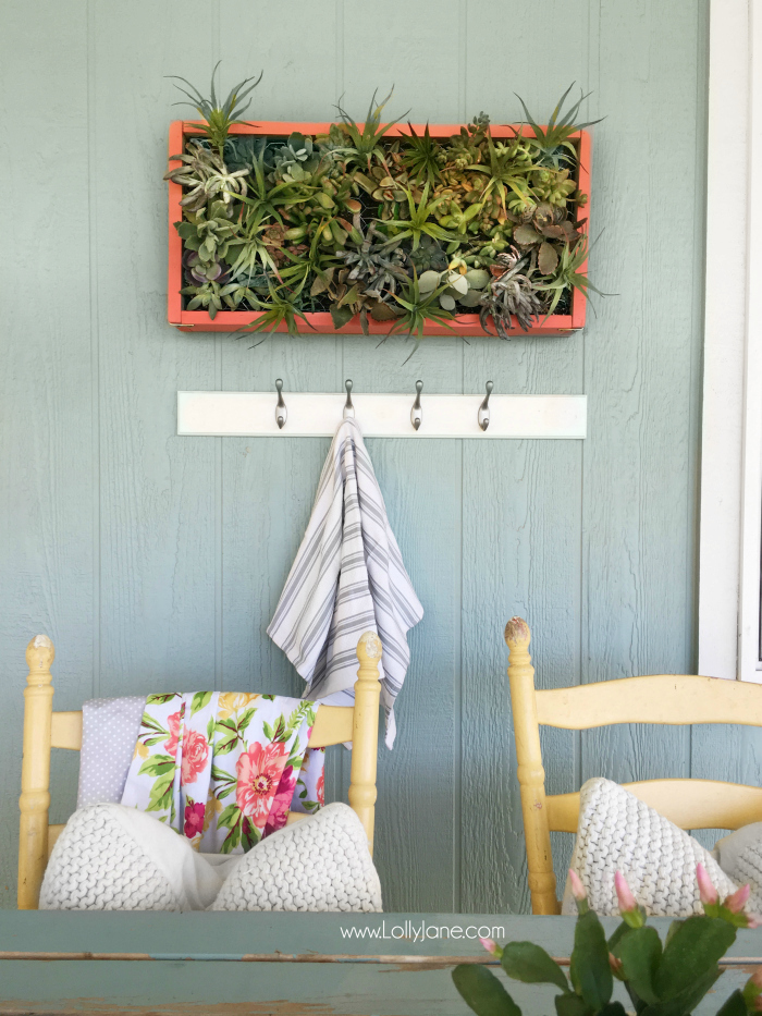 DIY vertical succulent garden | Learn how to build this DIY vertical succulent garden. Cute outdoor porch decor! Great outdoor wall decor idea, get the hanging plants onto the wall!