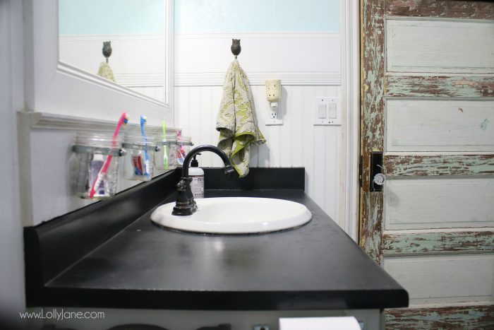 I chalk painted my bathroom countertops! I actually love my chalk paint laminate countertops, they are a fast solution to replace bathroom counters! Check out this easy chalk paint countertops tutorial! Great home renovation idea, super affordable bathroom remodeling idea.