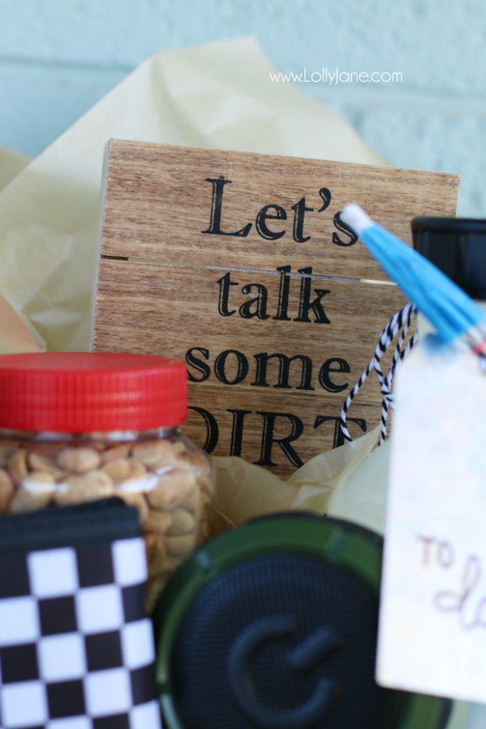 DIY Father's Day gift basket | Grab this premade crate but dress it up with some paint and leather handles. Fill it with your dad's favorite goodies to create the perfect Father's Day gift! Love this DIY Fathers Day gift basket!