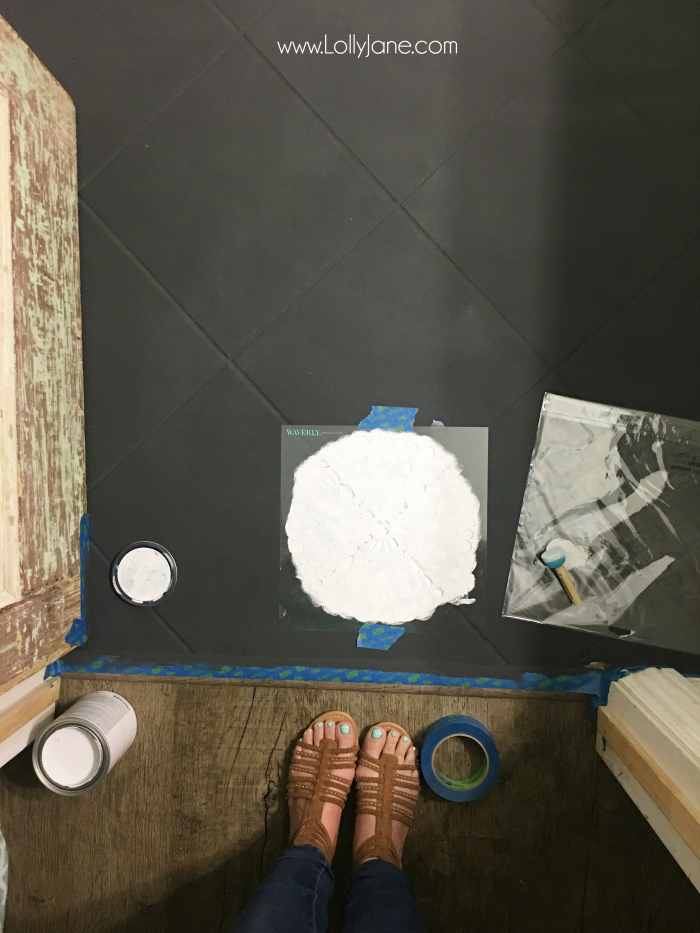 Super affordable bathroom floor makeover solution: how to chalk paint tile floors! So glad I painted my bathroom floors, they look amazing and we spent less than $50! Love this bathroom floor makeover!