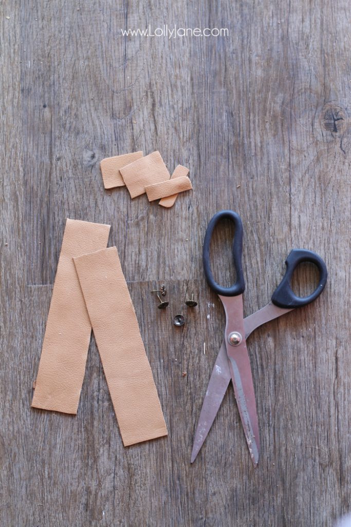 DIY Father's Day gift basket | Grab this premade crate but dress it up with some paint and leather handles. Fill it with your dad's favorite goodies to create the perfect Father's Day gift! Love this DIY Fathers Day gift basket!