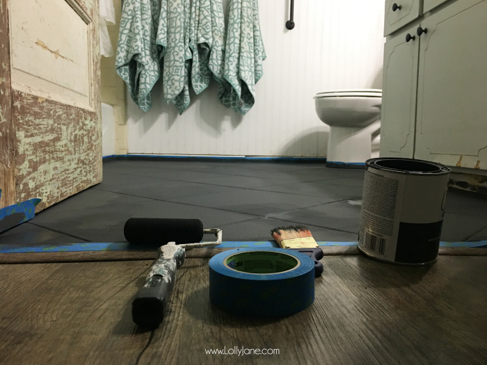 Super affordable bathroom floor makeover solution: how to chalk paint tile floors! So glad I painted my bathroom floors, they look amazing and we spent less than $50! Love this bathroom floor makeover!