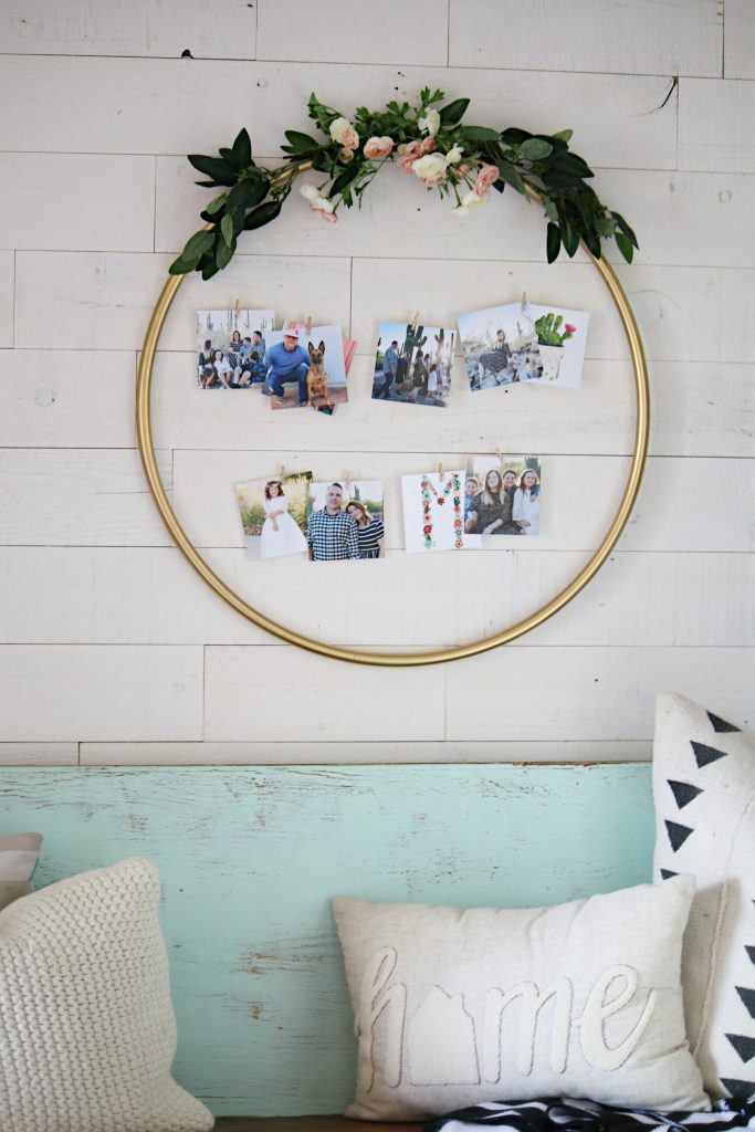 DIY Hula Hoop Photo Display | Check out this easy hula hoop photo display idea! Such a creative way to display pictures with unique items!