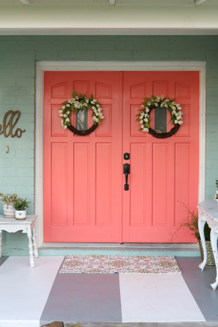 Loving these bright front doors! So easy to make a statement with bold front door paint choices using @decoart's Curb Appeal paint. Such cheery front doors on a colorful porch. Cute outdoor decor ideas!