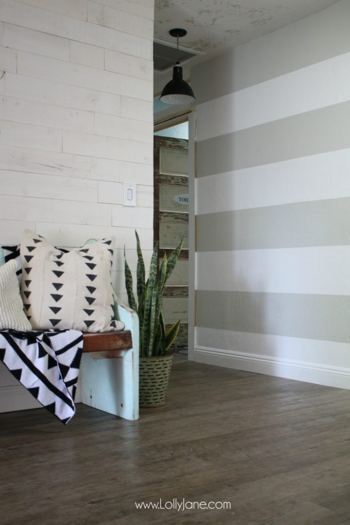 DIY Striped Accent Wall | I love this gray and white striped wall, such an easy tutorial on how to stripe walls with straight lines and no bleeding or touch ups! Adore this gray white home decor, such a cute accent wall!