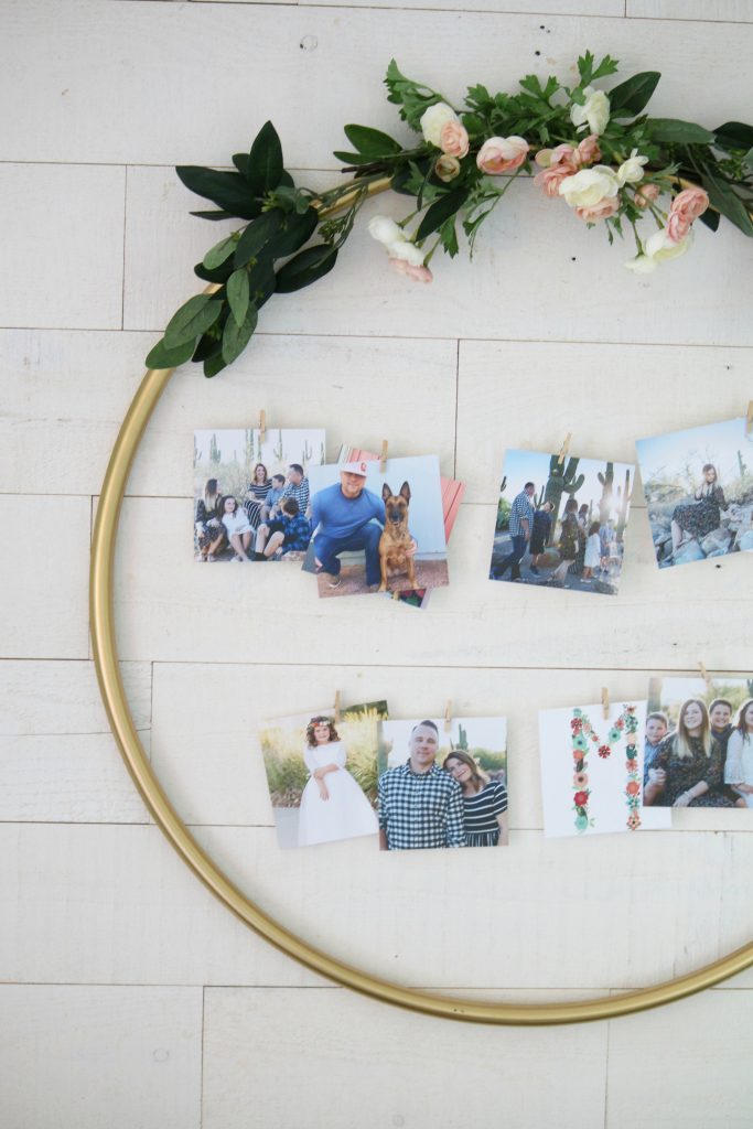 DIY Hula Hoop Photo Display | Check out this easy hula hoop photo display idea! Such a creative way to display pictures with unique items!