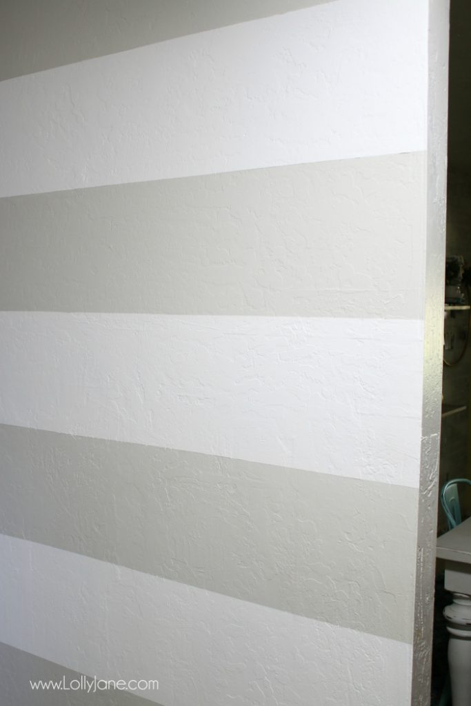 DIY Striped Accent Wall | I love this gray and white striped wall, such an easy tutorial on how to stripe walls with straight lines and no bleeding or touch ups! Adore this gray white home decor, such a cute accent wall!