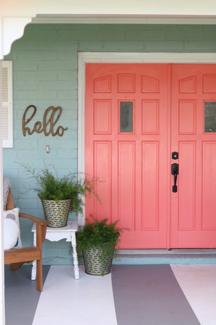 Loving these bright front doors! So easy to make a statement with bold front door paint choices using @decoart's Curb Appeal paint. Such cheery front doors on a colorful porch. Cute outdoor decor ideas!