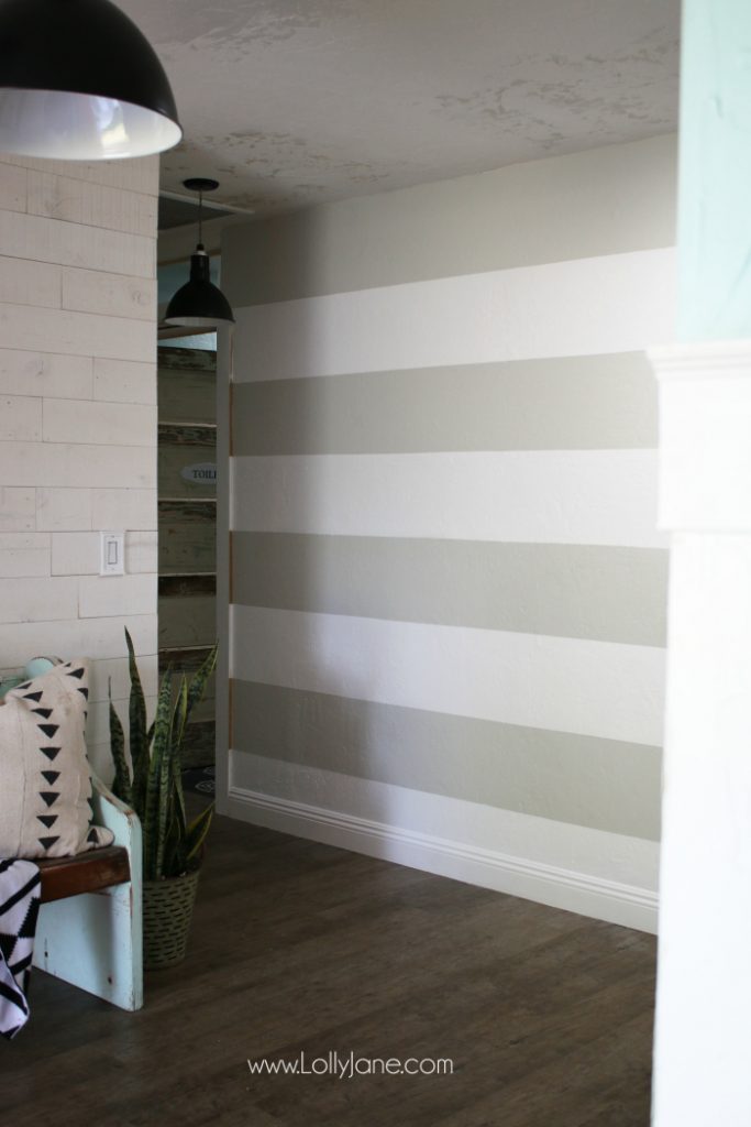 DIY Striped Accent Wall | I love this gray and white striped wall, such an easy tutorial on how to stripe walls with straight lines and no bleeding or touch ups! Adore this gray white home decor, such a cute accent wall!