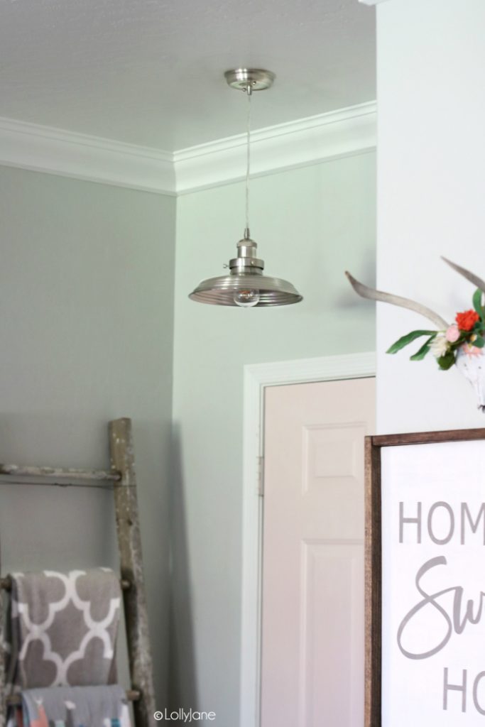 Styled entryway with the cutest mini metal pendant!