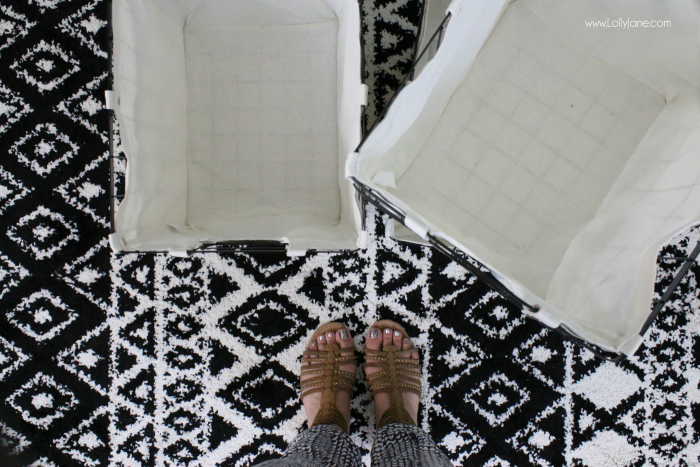 Love these stylish Walmart finds! Cute wire baskets and this trendy aztec black and white rug make great accessorizes for this farmhouse laundry room makeover!