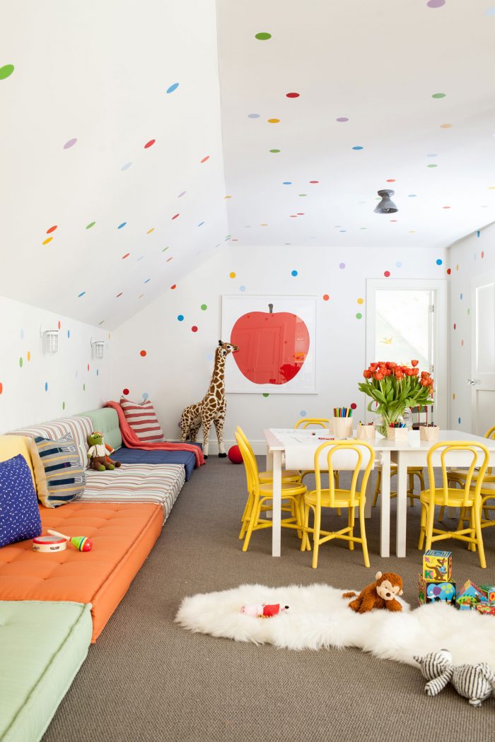 This reading nook in this colorful farmhouse playroom is the cutest!