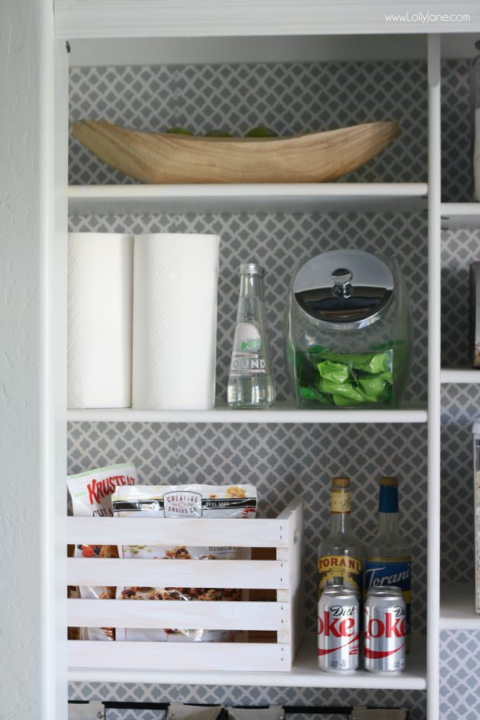 My new pantry shelves lined with wrapping paper from Michaels