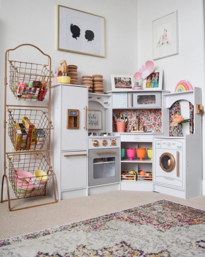 Cutest play kitchen! Love the floral wallpaper and gold accents!