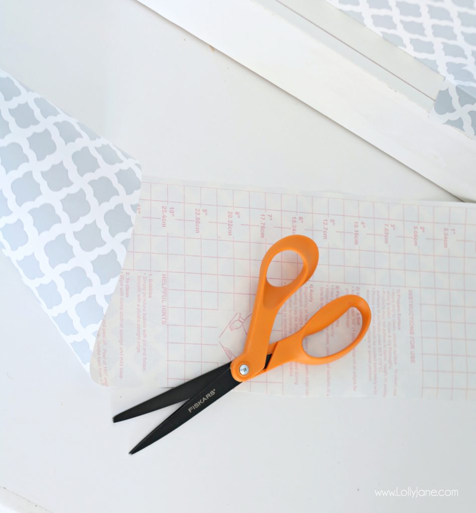 Easy pantry faux wallpaper makeover - Just Fiskars all-purpose scissors and a role of adhesive shelf liner can spruce up a pantry or closet in just minutes!