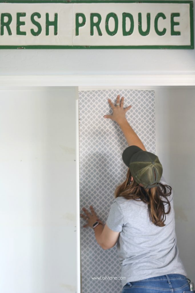 Easy pantry faux wallpaper makeover - See the amazing transformation of this boring pantry turned chic and organized with just 2 items! Click to see the before & after!