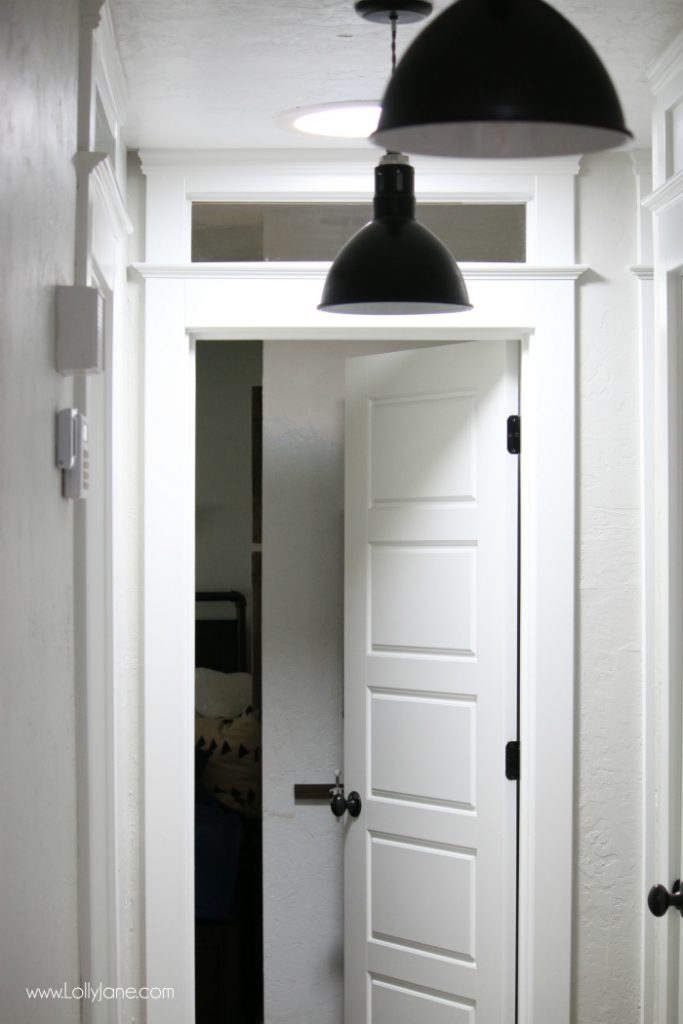 Love these black barn light pendants in this farmhouse makeover. Such a big difference!