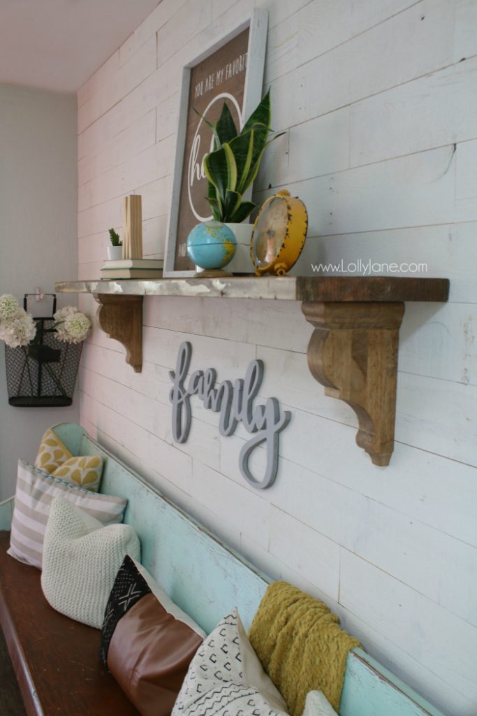 Loving this eclectic farmhouse decor! Learn how easy it is to make this easy rustic farmhouse shelf!