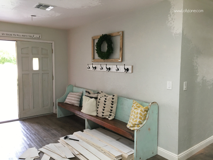 Stikwood shiplap before and after pictures. You won't believe the difference this barnwood wall treatment makes on this farmhouse entrway!