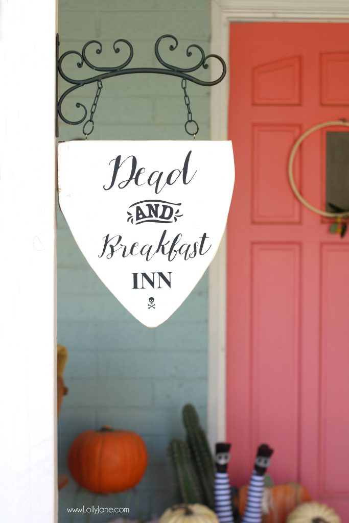 Easy DIY "Dead and Breakfast Inn" hanging sign, perfect for Halloween to welcome guests or trick-or-treaters into your home!