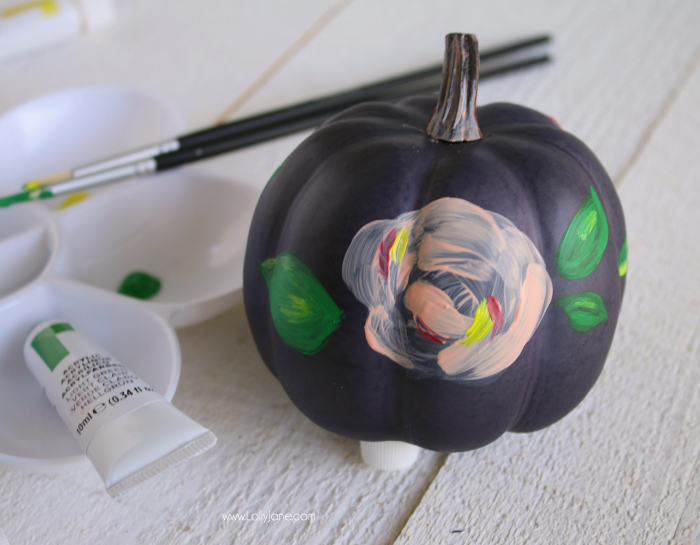 Spruce up boring pumpkins with Reeves acrylic paint and turn it into these cute plaid + floral pumpkins! 