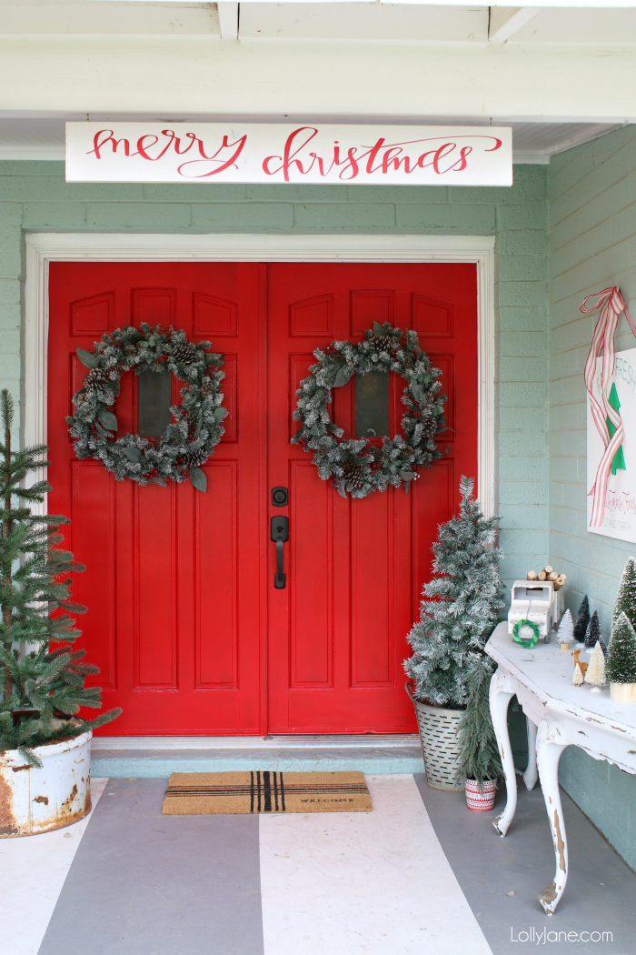 Red and white Christmas porch decorations. Lots of easy ways to make your outdoor Christmas porch cheery for the holidays!