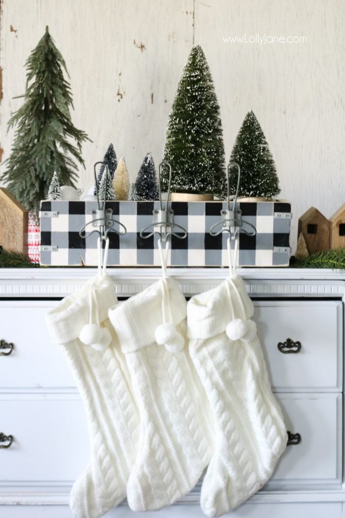 Easy diy stocking holder tutorial. Great way to store Christmas decor and hang your stockings if you don't have a mantel!