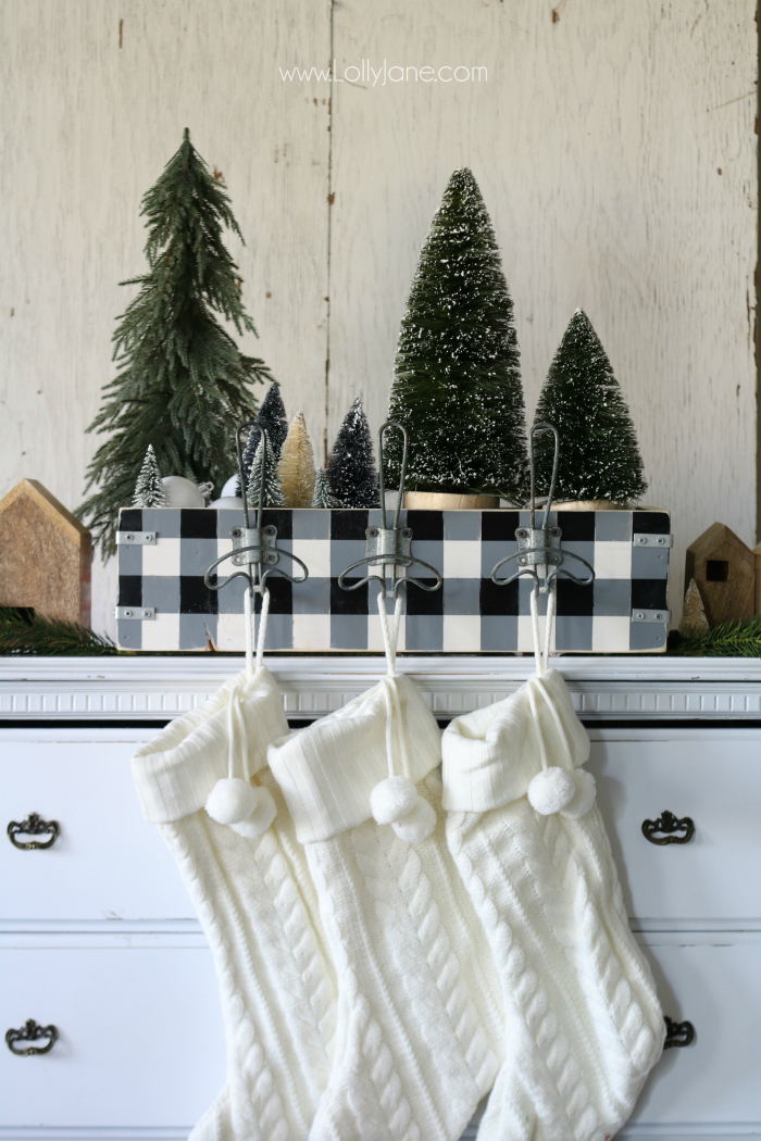 Looking for farmhouse Christmas decor ideas? This black white and buffalo check Christmas decor makes holiday decor easy and attractive! Love this diy stocking holder!