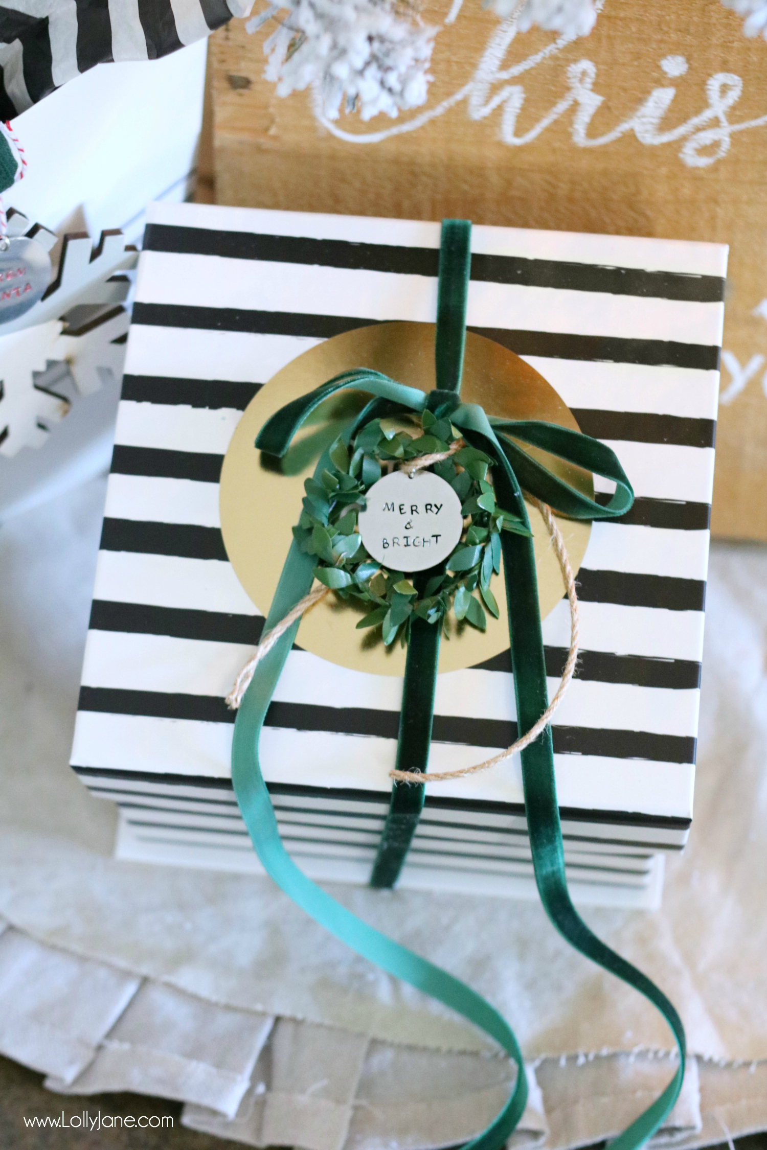 Love this DIY Stamped Metal Tag, perfect to tie onto Christmas or holiday gifts to personalize it. So pretty and EASY to make!