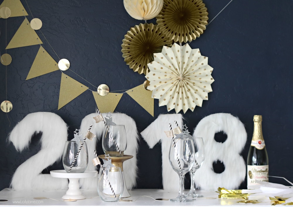 Cutest NYE display, love the simple decor like these DIY Fur Numbers. Spruce your NYE table in no time at all!