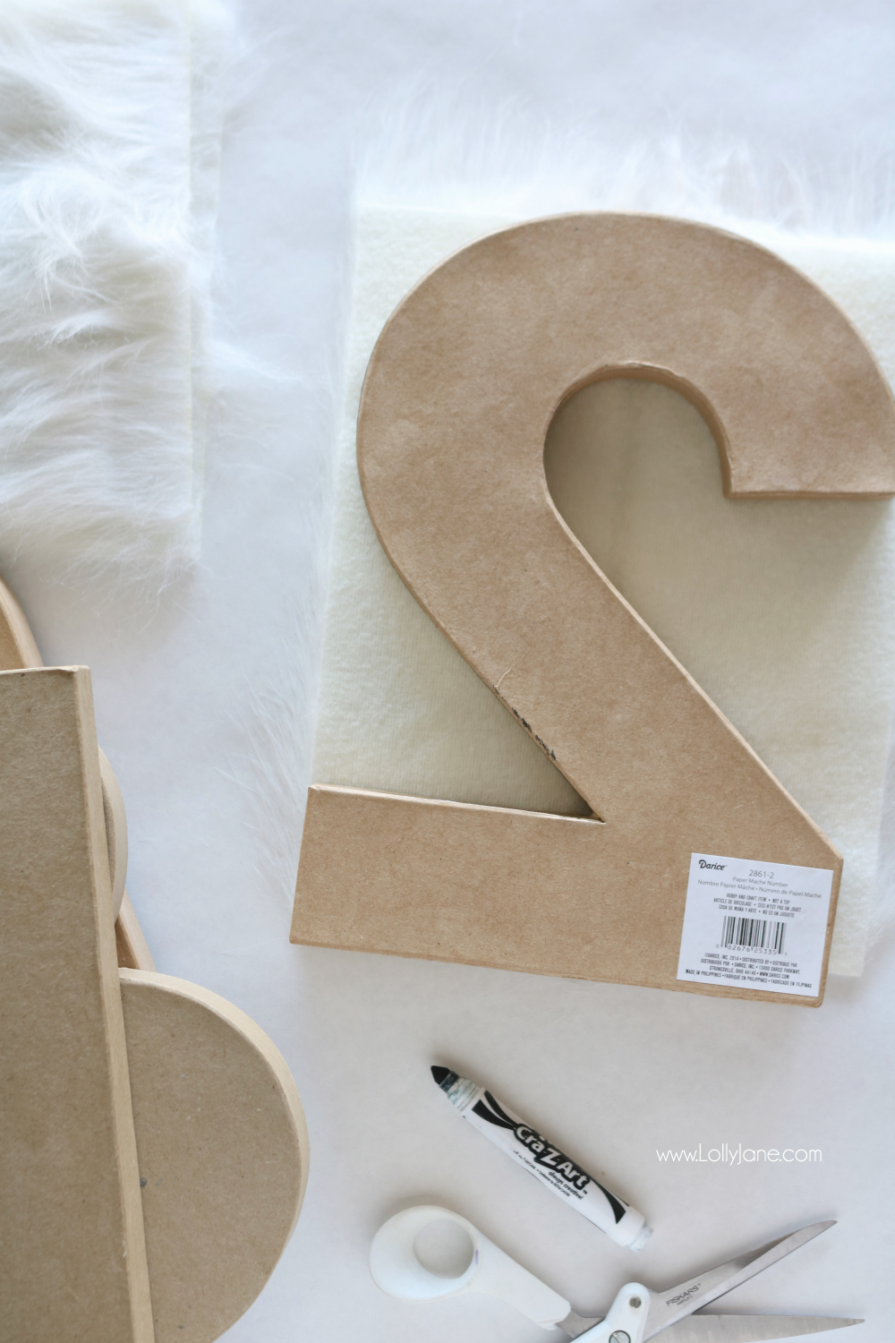 Give your paper numbers a little makeover with these easy DIY Fur Numbers tutorial!