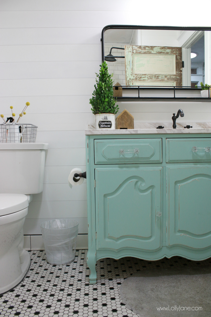 Farmhouse bathroom renovation ideas! Love this farmhouse bathroom remodel with classic finishes and timeless flooring.