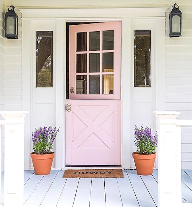 Gah! Dying over this light pink front door! It's called Peppermint Pink from Benjamin Moore and is such a pretty pink exterior door color! Stunning front door!