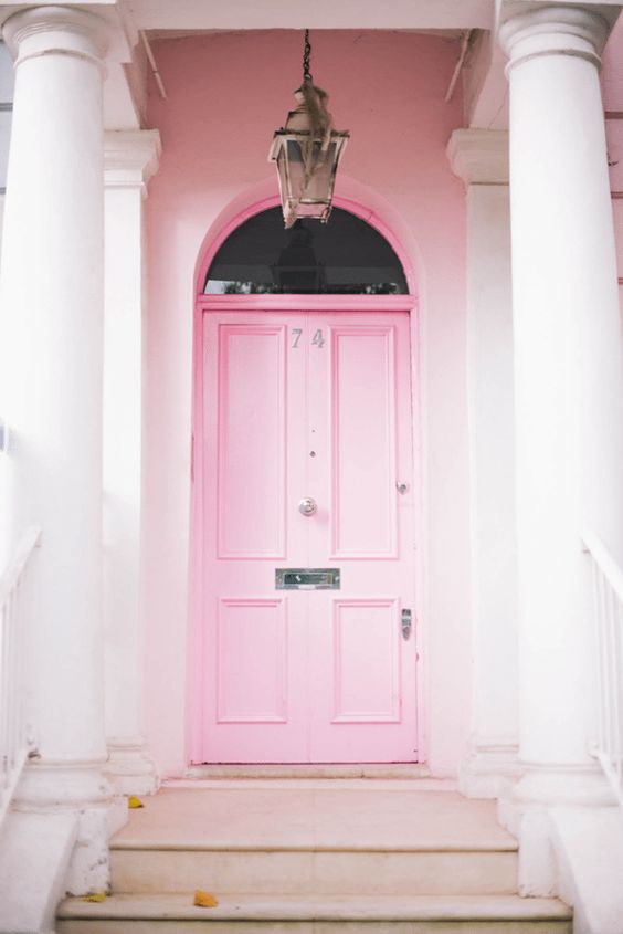 Loving this Pepto Bismol pink door, in a good way! <3 Such a pretty pink exterior door! I would love this pink porch decor, wow!