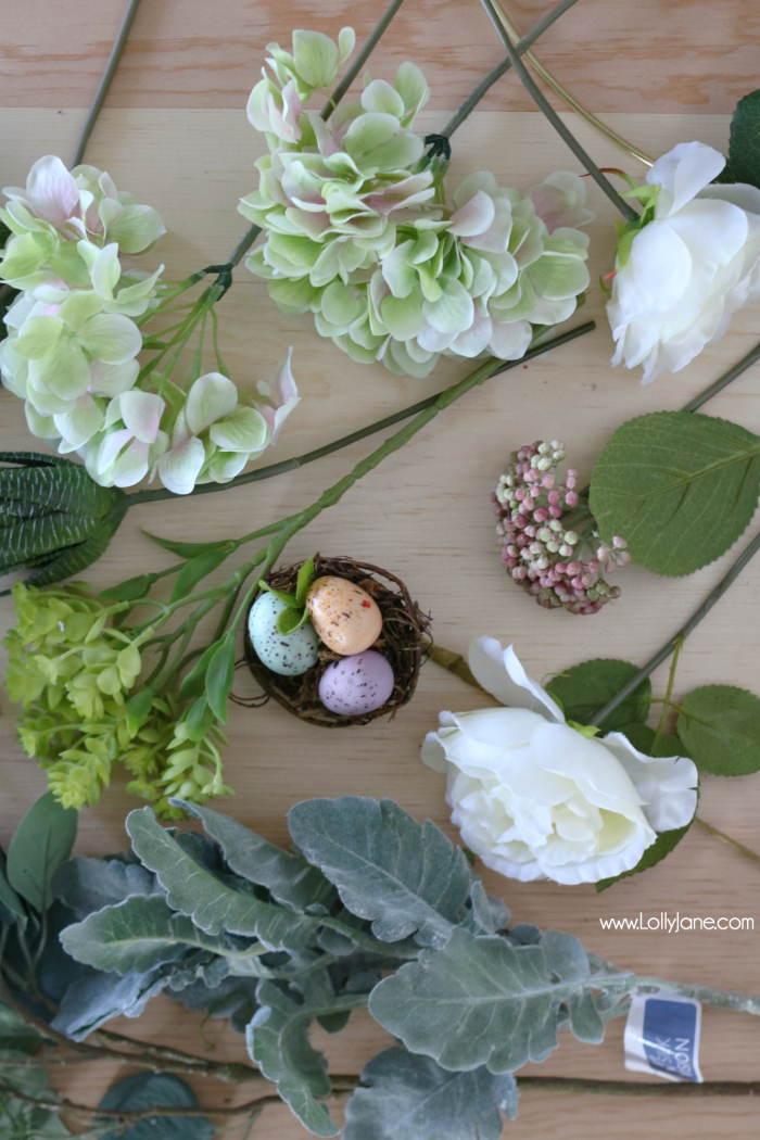 With this handful of supplies you can make an easy Embroidery Hoop Spring Wreath! So cute to pair with Easter decor! 