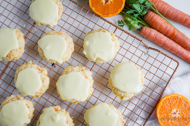 Such an easy carrot cookies recipe with orange glaze frosting. This zesty orange glaze for carrot cookies are the perfect topping for our light and fluffy carrot cookies!