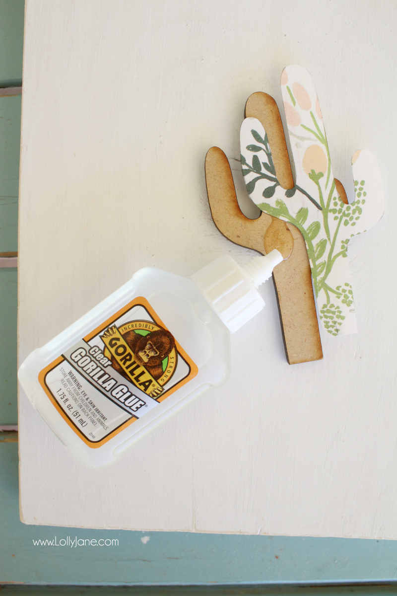 How to decoupage with gorilla glue a wood cactus cutout. Makes a cute wood home decor sign!