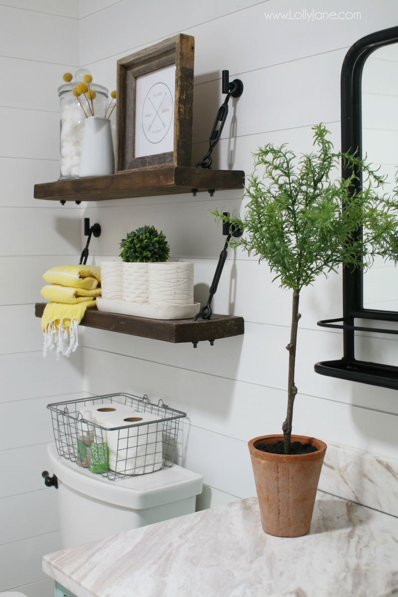 These DIY Turnbuckle Shelves in this farmhouse bathroom decor look awesome in this colorful bathroom remodel. Loving the pops of yellow in this guest bathroom!