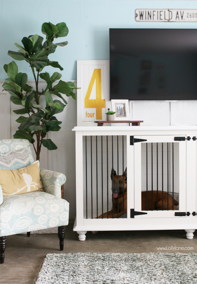 Love this dog furniture crate! This trendy tv stand doubles as a wood farmhouse dog kennel! Such cute decor with the barn style doors, stylish dog furniture!