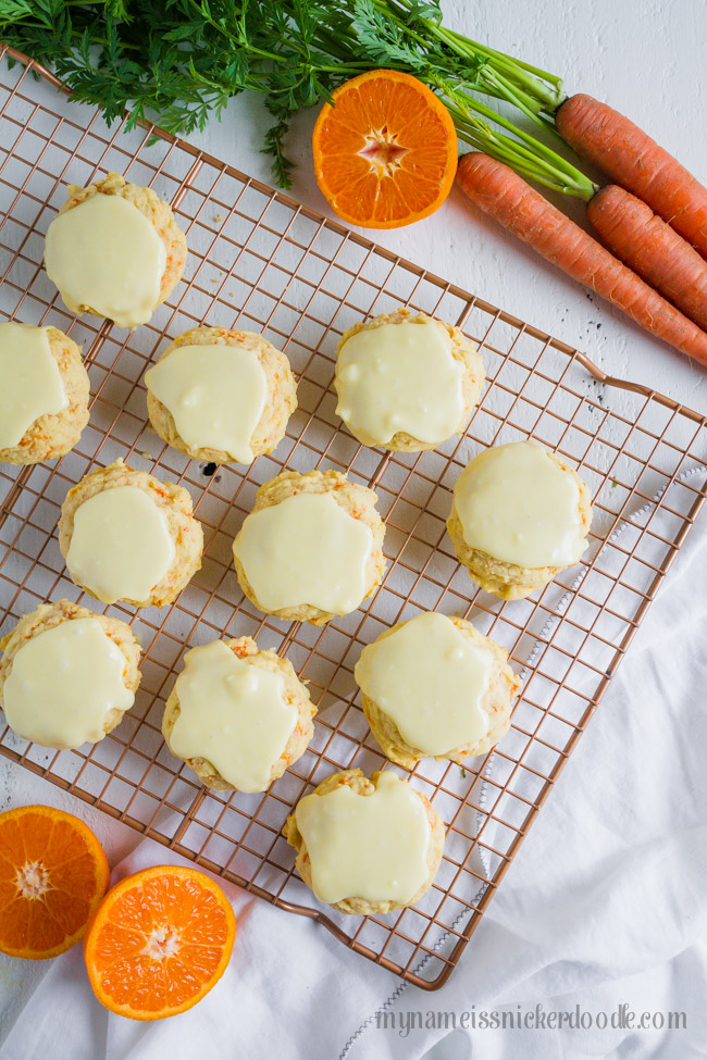 Our favorite iced carrot cookies: A soft cake-like cookie made with carrots and a tangy orange glaze frosting. Super easy to make carrot cookies, yum! 