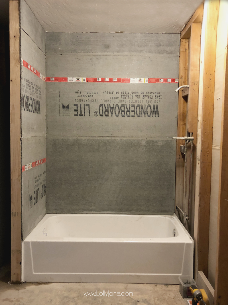 Turning a shower into a tub shower combo renovation, love how this farmhouse bathroom renovation is coming along!