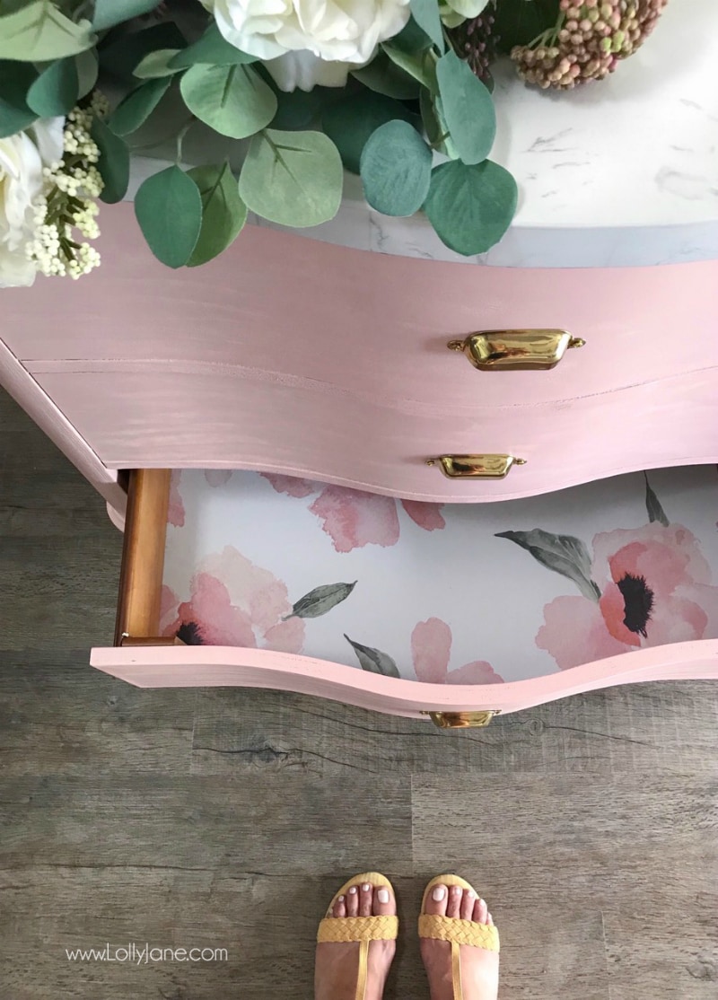 Loving this painted pink vanity makeover from Lolly Jane! Such a cute glam farmhouse bathroom makeover!