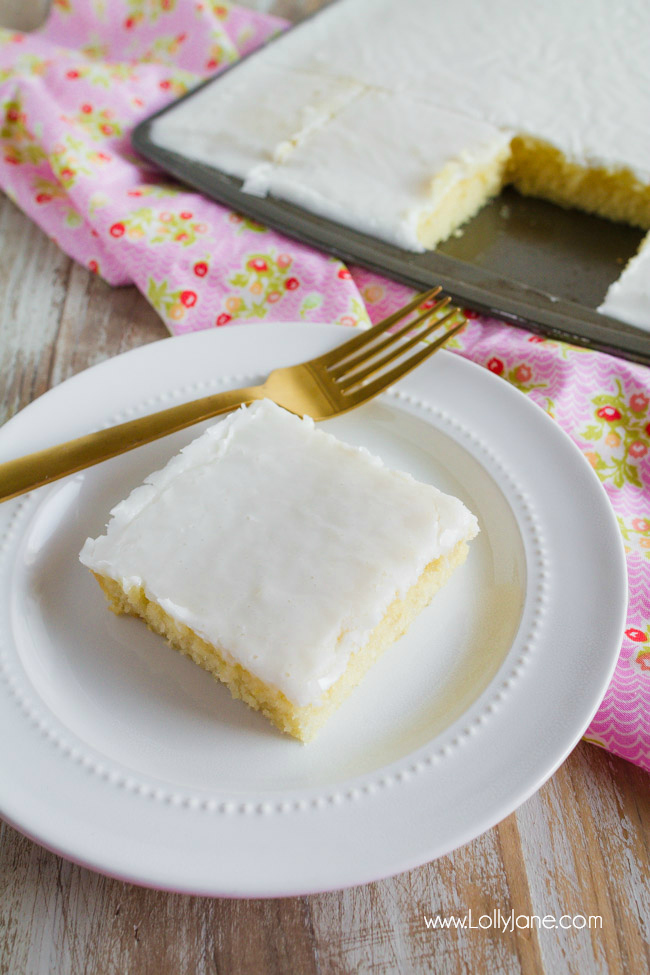 Loving this easy to make white Texas sheetcake with vanilla frosting! The buttery cake mix with the almond frosting is a huge hit with the family! Such an easy dessert bar idea!
