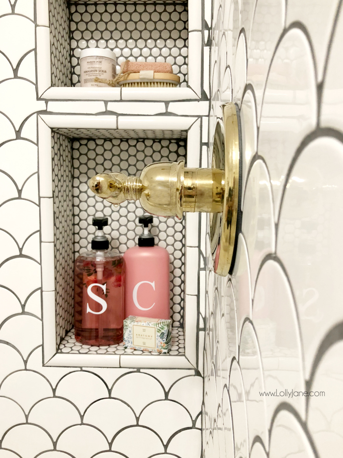 Built in shower tub combo shelf with pretty fan tile and penny tile, love this farmhouse bathroom remodel!