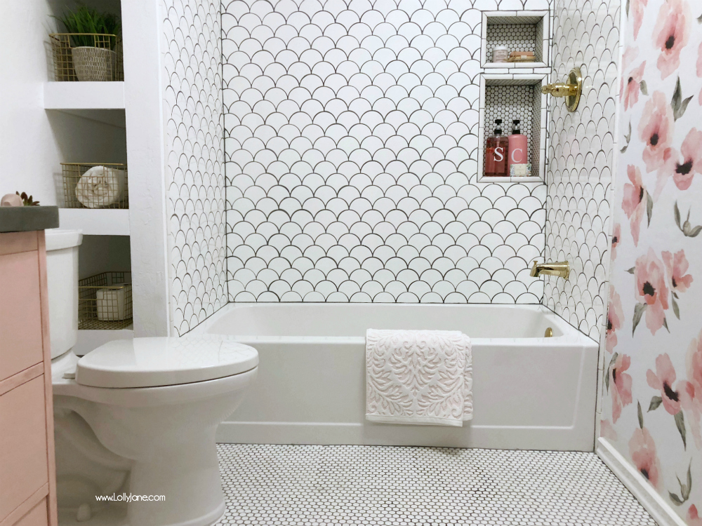 Obsessed with this GLAM fully renovated farmhouse bathroom with pops of gold and pink. SO GORGEOUS!