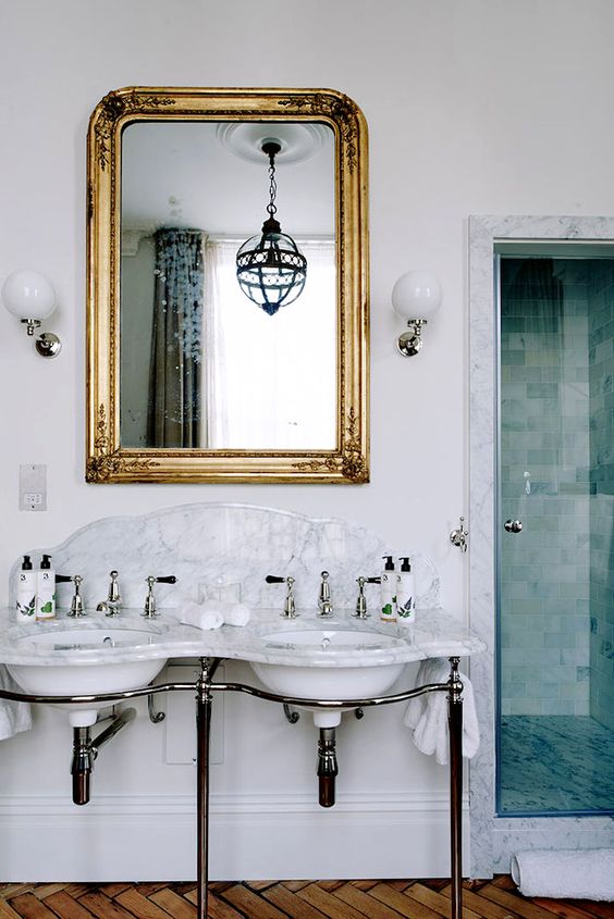 Lovely gold mirror with a modern bathroom remodel, so pretty!!